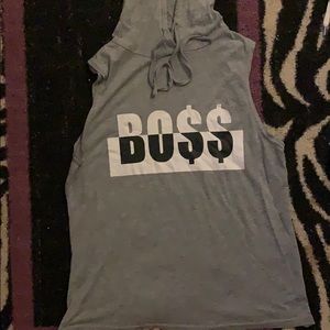 Sleeve less shirt , with a hood.